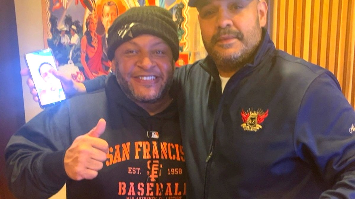 Friends enjoying cigars and good company at the bourbon tasting