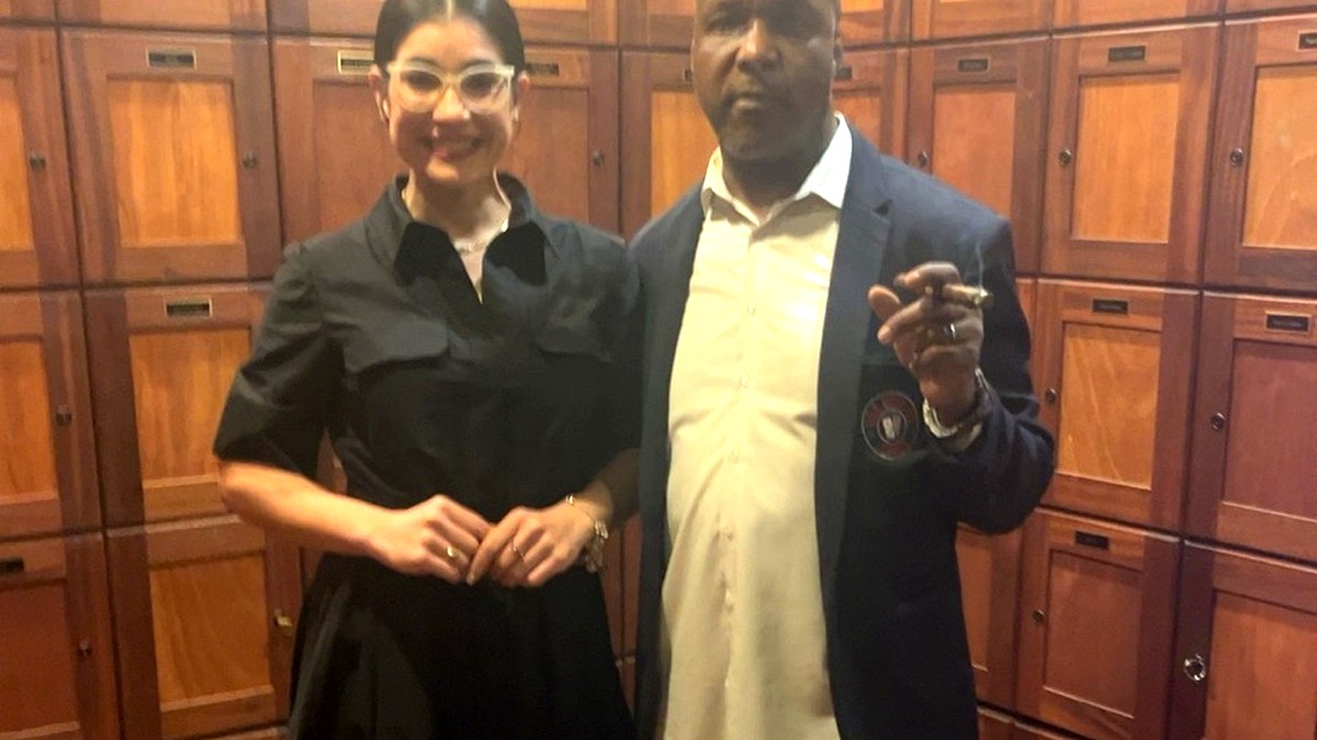 Guests posing at the Fuego Fashion event, captured by Hariel Xavier Photography