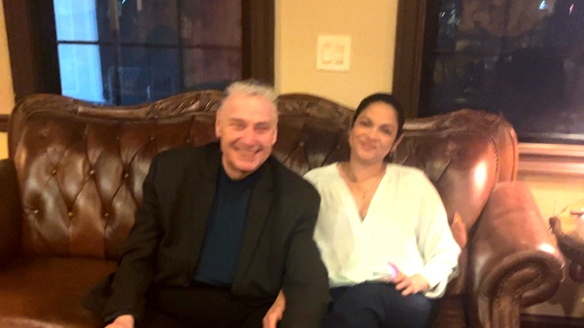 Guests relaxing on leather couches at Casa Del Tabaco